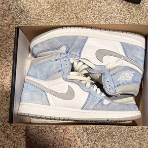 Nike Air Jordan 1 Retro High OG in Black and Gold